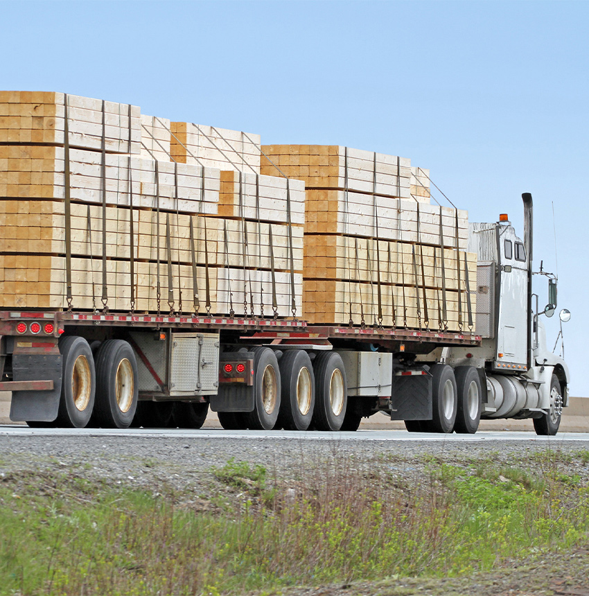 Flatbed Truck with Lumber on Road
